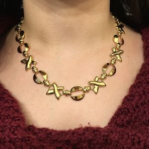 Vintage gold tone XO necklace